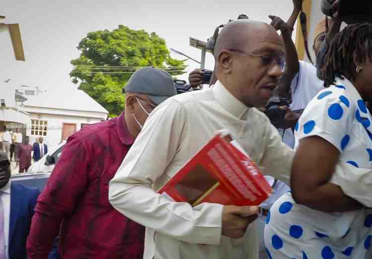 Extras Emefiele Arrives Court with Bible Tucked Under His Arm Godwin Emefiele the Suspended Central Bank of Nigeria cbn Governor Was on Tuesday Arraigned at the Federal High Court Sitting in Ikoyi Lagos on Two Godwin Emefiele the Suspended Central Bank of Nigeria cbn Governor Was on Tuesday Arraigned at the Federal High Court Sitting in Ikoyi Lagos on Two