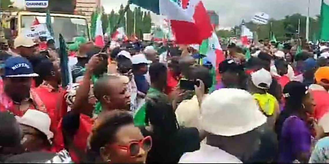 JUST IN: Pandemonium as protesters destroy NASS gate in Abuja, force way into premises