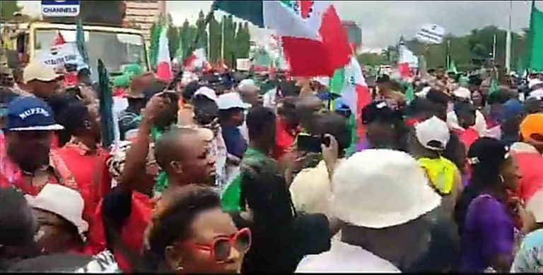 JUST IN: Pandemonium as protesters destroy NASS gate in Abuja, force way into premises