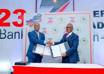 R-L: Group Managing Director/CEO of Zenith Bank Plc, Dr. Ebenezer Onyeagwu and the Secretary-General of the AfCFTA Secretariat, His Excellency Wamkele Mene during the signing of a Memorandum of Understanding (MoU) between Zenith Bank Plc and  AfFCTA for the development of a smart portal, at the 8th Annual Edition of the Zenith Bank International Trade Seminar on Non-Oil Export held at the Civic Centre, Victoria Island, Lagos, on Monday.