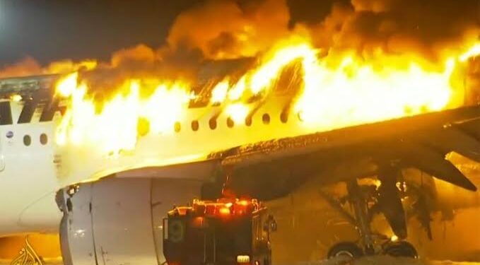 a Japan Airlines Plane is on Fire After Landing on a Runway at the Haneda Airport in Tokyo the Countrys Capital City a Japan Airlines Plane is on Fire After Landing on a Runway at the Haneda Airport in Tokyo the Countrys Capital City