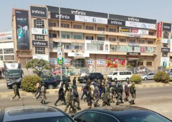 BREAKING: Pandemonium as soldiers, traders clash in Abuja shopping plaza