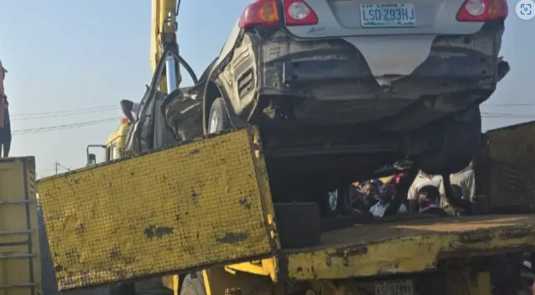 Driver escapes death as 40ft container falls on car